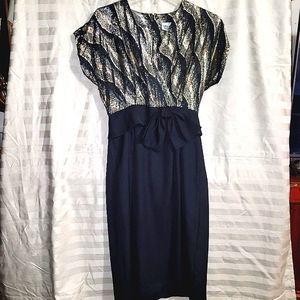 Formal Dress by Melissa Petites bottom of dress is black, ⁷black bow at waist